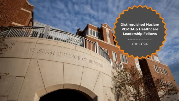 Skyward angled photo of the Haslam Business Building's south balcony with the words
