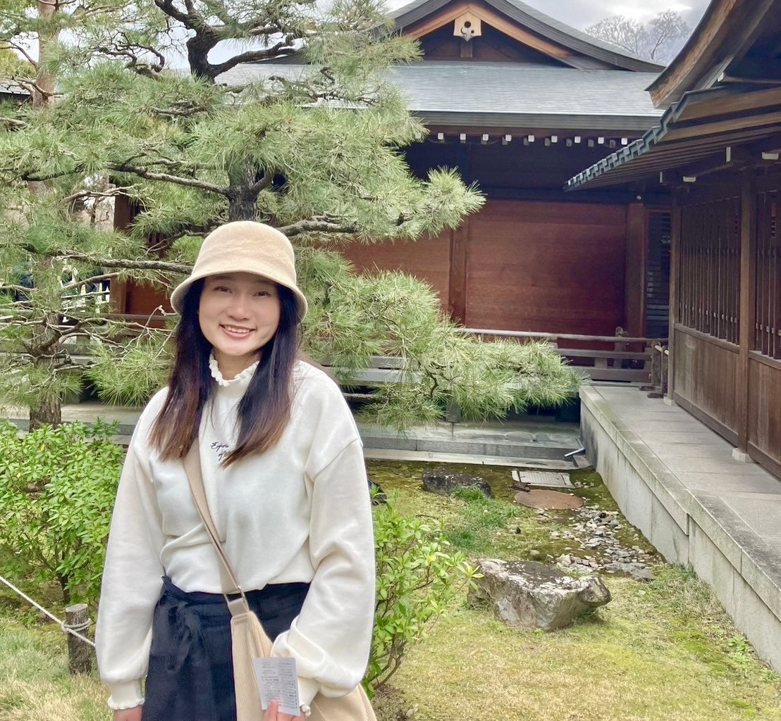 haslam student outside an asian themed house