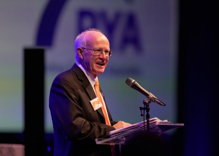 Dean Steve Mangum giving speech
